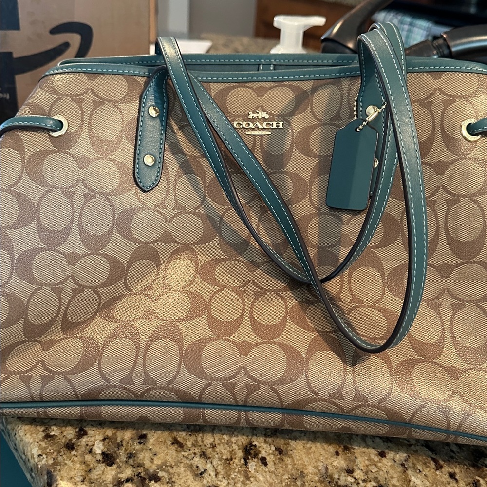 Coach drawstring tote-khaki signature. EUC